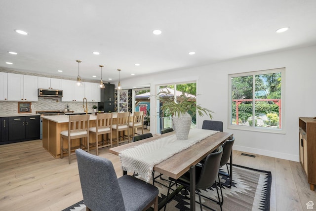 2038 W 8970 S, West Jordan, UT 84088 - dining room with plenty of natural light, light wood-style flooring, and recessed lighting