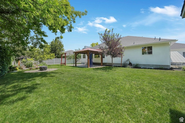 2038 W 8970 S, West Jordan, UT 84088 - back of house with a gazebo, an outdoor fire pit, and a patio