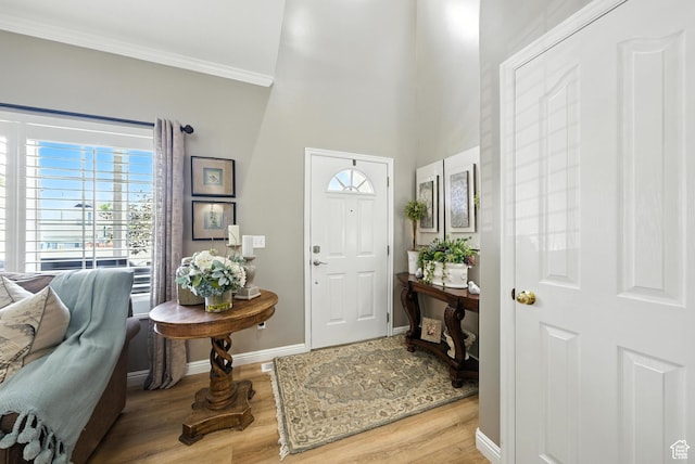 11803 Burkwood Ln, Draper, UT 84020 - foyer entrance with wood finished floors and crown molding