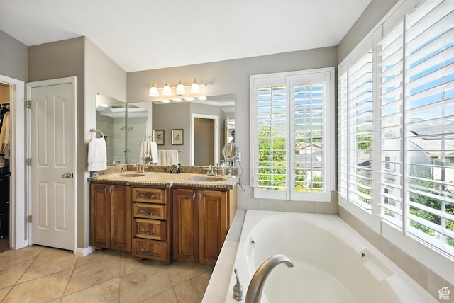 11803 Burkwood Ln, Draper, UT 84020 - bathroom with a bath, double vanity, tile patterned floors, a walk in closet, and a shower with shower door