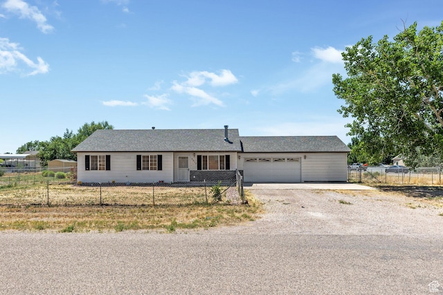 5317 N 2700 W, Cedar City, UT 84721 - ranch-style house with dirt driveway and a garage