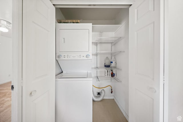 5317 N 2700 W, Cedar City, UT 84721 - laundry area featuring stacked washing machine and dryer and baseboards