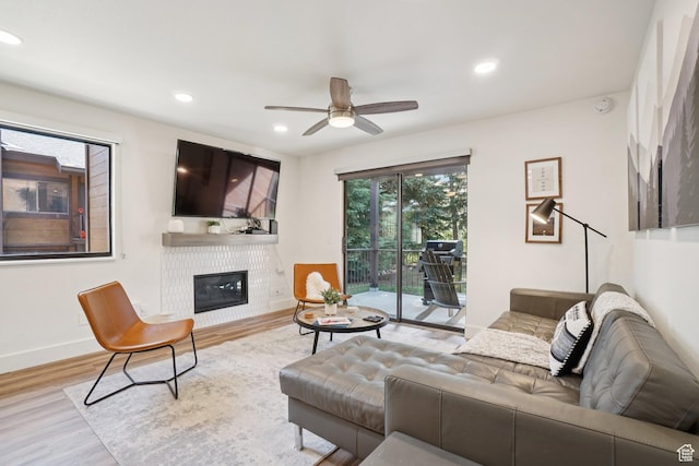 2025 Canyons Resort Dr Unit I1, Park City, UT 84098 - living area featuring wood finished floors, a ceiling fan, a glass covered fireplace, and recessed lighting