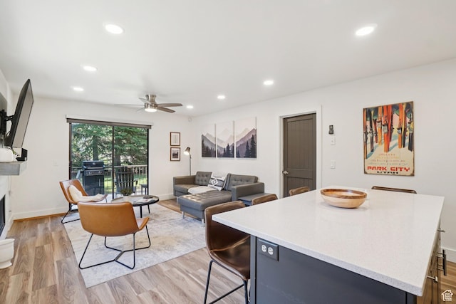 2025 Canyons Resort Dr Unit I1, Park City, UT 84098 - living room with light wood-type flooring, a ceiling fan, recessed lighting, and a fireplace