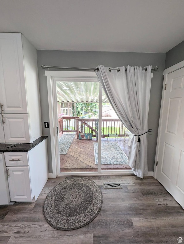 1704 S Sorrento Dr, Woods Cross, UT 84087 - doorway to outside with wood finished floors and baseboards
