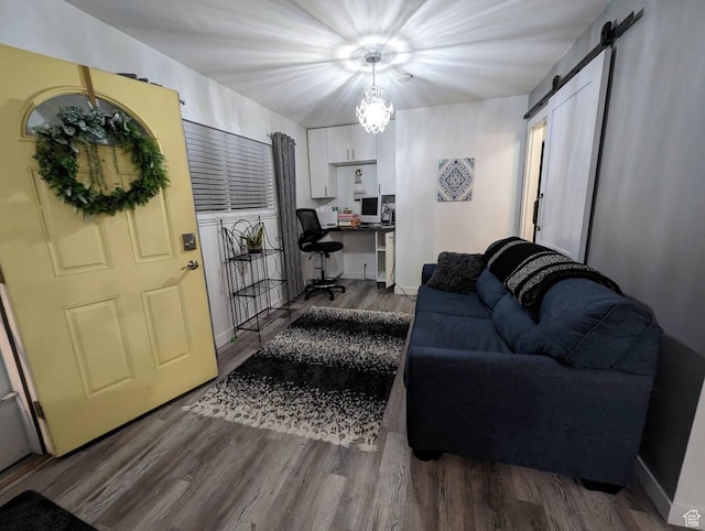 1704 S Sorrento Dr, Woods Cross, UT 84087 - entryway featuring wood finished floors, a barn door, and a chandelier