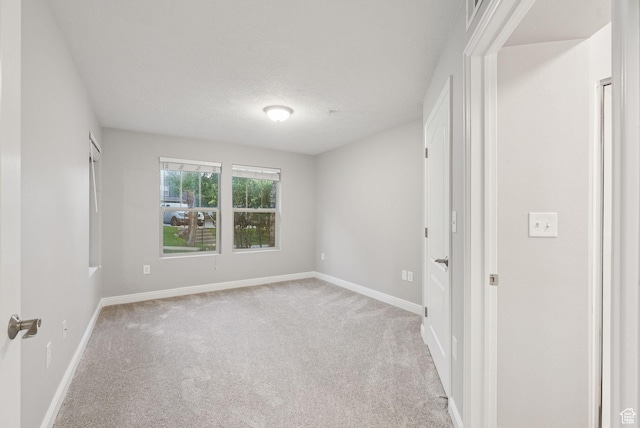 1729 Fox Bay Dr Unit J104, Heber City, UT 84032 - spare room featuring light colored carpet