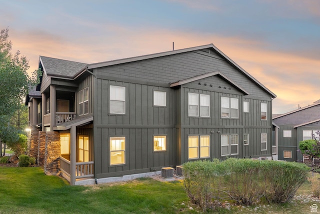 1729 Fox Bay Dr Unit J104, Heber City, UT 84032 - back of property with board and batten siding and a lawn
