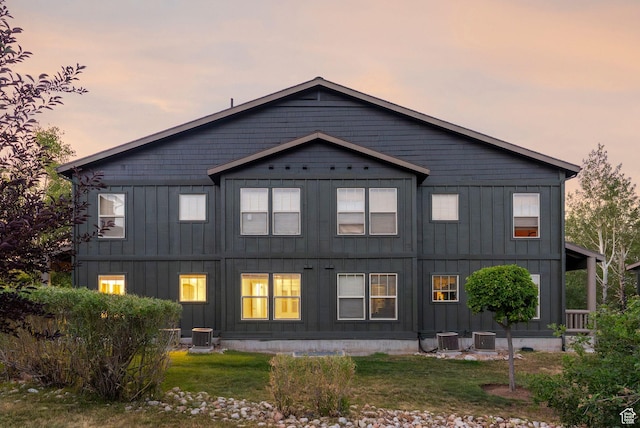 1729 Fox Bay Dr Unit J104, Heber City, UT 84032 - back of house featuring board and batten siding and a lawn