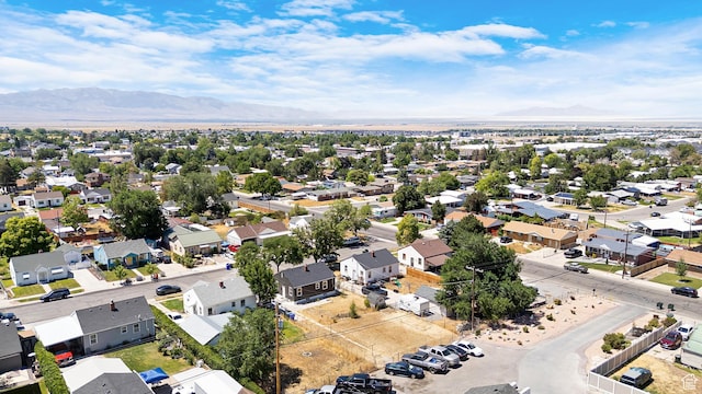 482 N Brook Ave E, Tooele, UT 84074 - aerial perspective of suburban area featuring a mountain backdrop