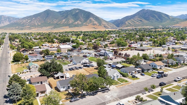 482 N Brook Ave E, Tooele, UT 84074 - aerial perspective of suburban area featuring a mountain backdrop
