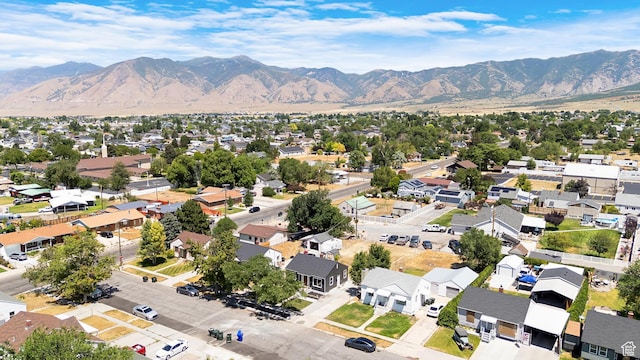 482 N Brook Ave E, Tooele, UT 84074 - aerial perspective of suburban area with a mountain backdrop