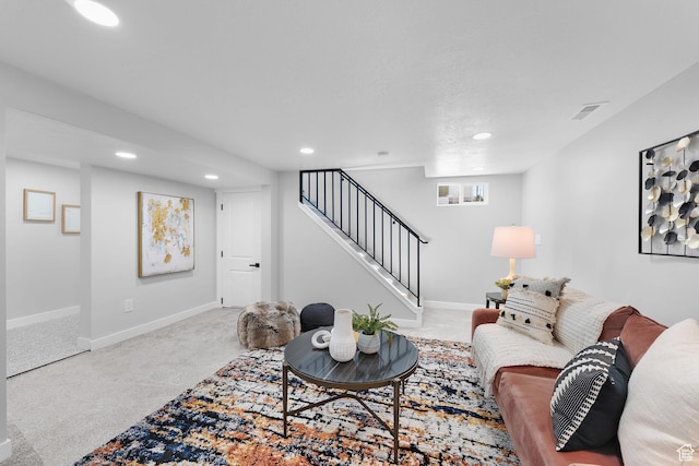 482 N Brook Ave E, Tooele, UT 84074 - carpeted living room with recessed lighting and stairs