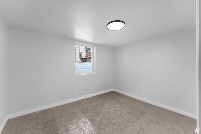 482 N Brook Ave E, Tooele, UT 84074 - spare room featuring carpet floors and a textured ceiling