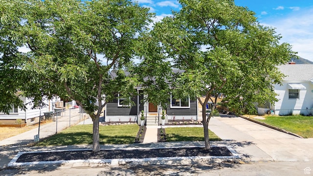 482 N Brook Ave E, Tooele, UT 84074 - obstructed view of property featuring a front yard