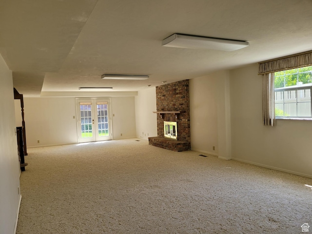 1360 Lakeview Dr, Bountiful, UT 84010 - unfurnished living room with a brick fireplace and carpet floors