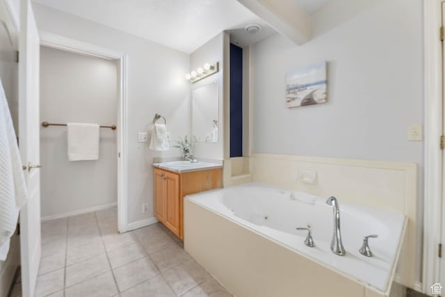 4072 S 300 E Unit 8, Salt Lake City, UT 84107 - bathroom featuring vanity, a whirlpool tub, and tile patterned floors