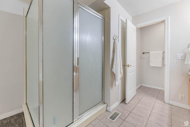 4072 S 300 E Unit 8, Salt Lake City, UT 84107 - bathroom featuring a shower stall and tile patterned flooring