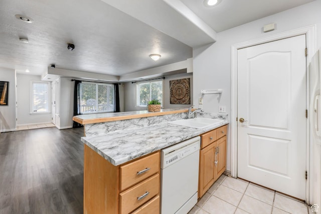 4072 S 300 E Unit 8, Salt Lake City, UT 84107 - kitchen featuring dishwasher, a peninsula, open floor plan, light wood finished floors, and recessed lighting