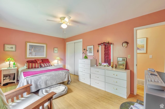 4790 Burch Dr, South Ogden, UT 84403 - bedroom with light wood-style flooring, a closet, and ceiling fan