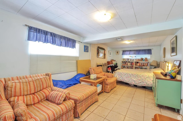 4790 Burch Dr, South Ogden, UT 84403 - bedroom featuring light tile patterned floors and a fireplace