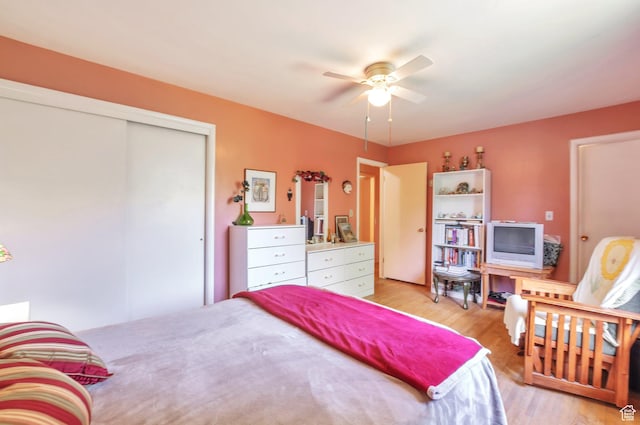 4790 Burch Dr, South Ogden, UT 84403 - bedroom featuring light wood-type flooring, a closet, and ceiling fan