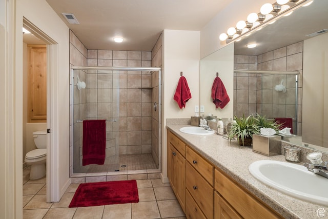 3686 S Spanish Valley Dr Unit N-2, Moab, UT 84532 - full bathroom with double vanity, a shower stall, and tile patterned flooring