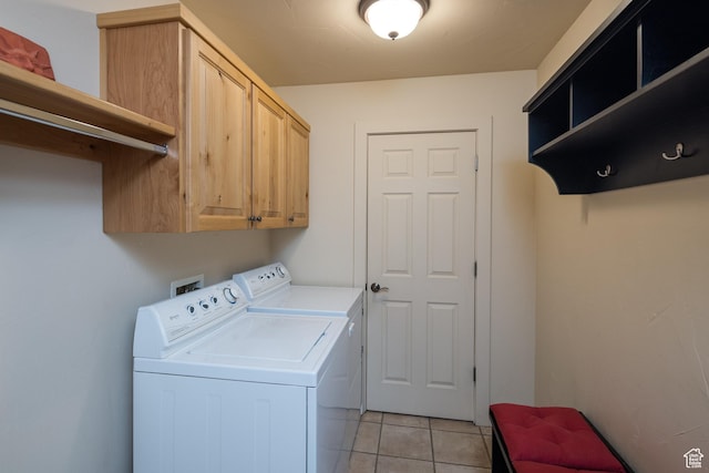 3686 S Spanish Valley Dr Unit N-2, Moab, UT 84532 - laundry room featuring independent washer and dryer, light tile patterned flooring, and cabinet space