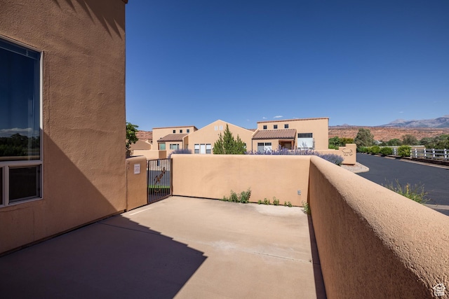 3686 S Spanish Valley Dr Unit N-2, Moab, UT 84532 - patio / terrace featuring a mountain view and a gate