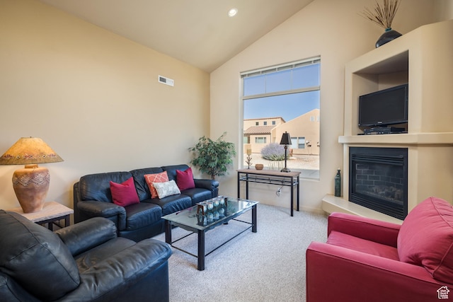 3686 S Spanish Valley Dr Unit N-2, Moab, UT 84532 - living area with carpet flooring, high vaulted ceiling, and a glass covered fireplace