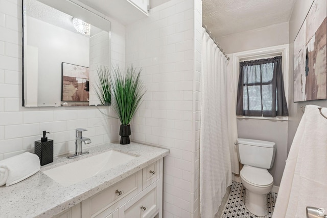 2353 E Logan Cir, Salt Lake City, UT 84108 - full bathroom with vanity, tile walls, a textured ceiling, backsplash, and a shower with shower curtain
