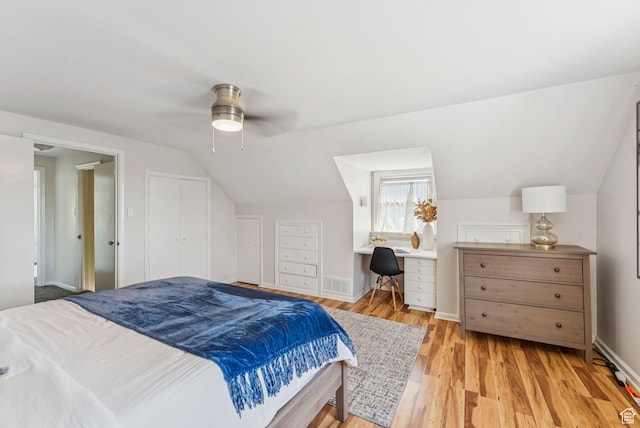 2353 E Logan Cir, Salt Lake City, UT 84108 - bedroom with vaulted ceiling, wood finished floors, an office area, and a ceiling fan