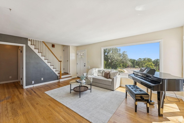 2353 E Logan Cir, Salt Lake City, UT 84108 - living area featuring stairs and light wood finished floors