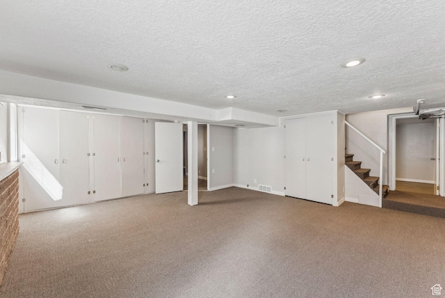 2353 E Logan Cir, Salt Lake City, UT 84108 - finished basement with stairway, carpet, a textured ceiling, and recessed lighting