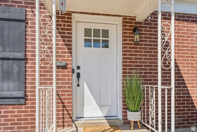 2353 E Logan Cir, Salt Lake City, UT 84108 - view of exterior entry featuring brick siding