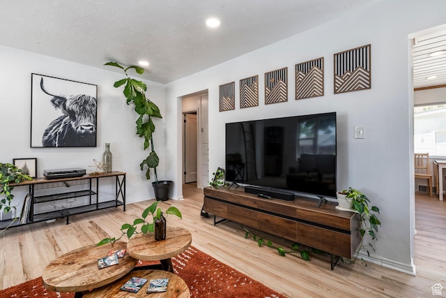 2605 E Simpson Ave, Salt Lake City, UT 84109 - living area with wood finished floors and recessed lighting
