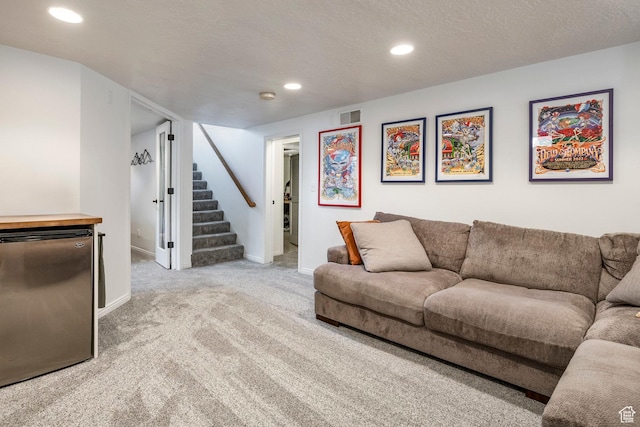2605 E Simpson Ave, Salt Lake City, UT 84109 - living room with stairway, carpet flooring, and recessed lighting
