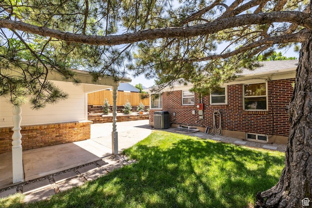 2605 E Simpson Ave, Salt Lake City, UT 84109 - view of yard featuring a patio