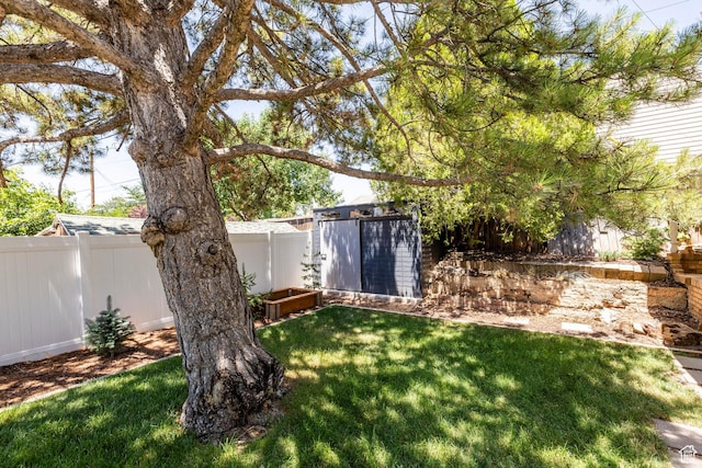 2605 E Simpson Ave, Salt Lake City, UT 84109 - fenced backyard with a shed