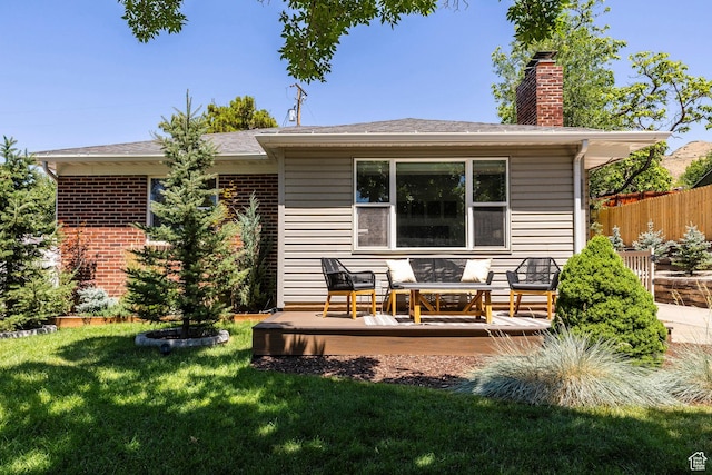 2605 E Simpson Ave, Salt Lake City, UT 84109 - rear view of house featuring a chimney and a wooden deck