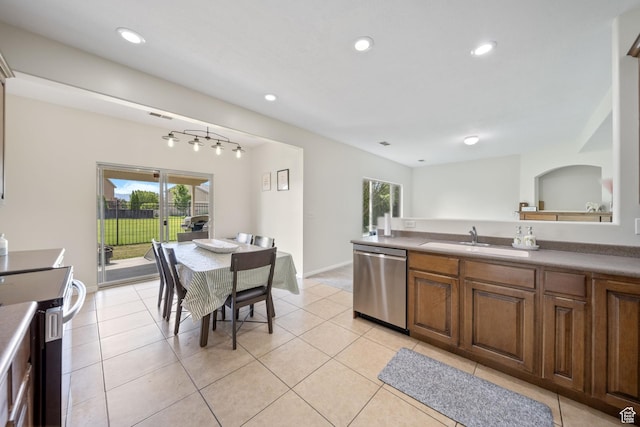 202 S 2035 W, Lehi, UT 84043 - kitchen with dishwasher, plenty of natural light, recessed lighting, light tile patterned flooring, and brown cabinetry