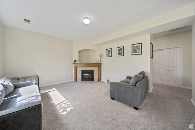 202 S 2035 W, Lehi, UT 84043 - carpeted living room featuring a tiled fireplace and baseboards