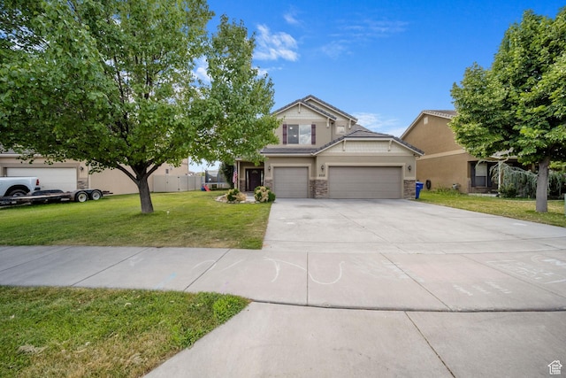202 S 2035 W, Lehi, UT 84043 - view of front of property with stone siding, a front lawn, concrete driveway, and a garage