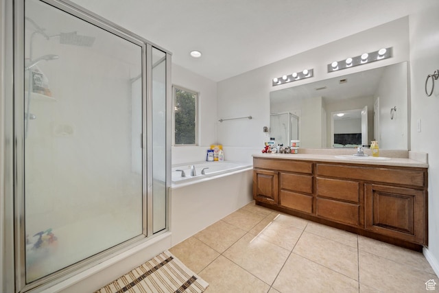 202 S 2035 W, Lehi, UT 84043 - full bath featuring vanity, a shower stall, a garden tub, and tile patterned floors