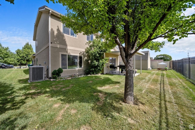 202 S 2035 W, Lehi, UT 84043 - rear view of property featuring stucco siding, a fenced backyard, a shed, and a patio