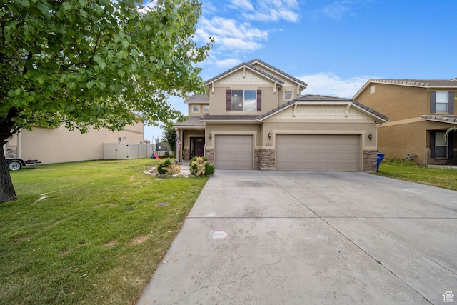 202 S 2035 W, Lehi, UT 84043 - view of front of home with stone siding, concrete driveway, a front lawn, and stucco siding