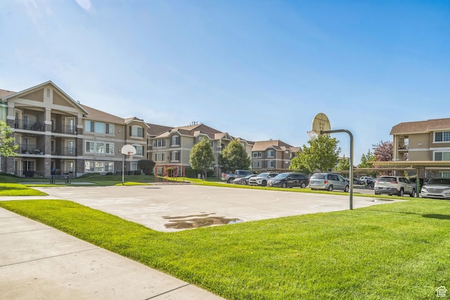 1195 W Dallin Dr Unit R-201, Pleasant Grove, UT 84062 - view of basketball court featuring a yard, community basketball court, and a residential view