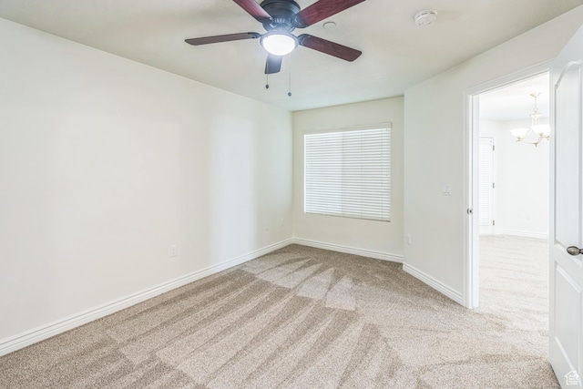 1195 W Dallin Dr Unit R-201, Pleasant Grove, UT 84062 - carpeted empty room featuring a smoke detector, a chandelier, and a ceiling fan