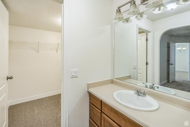 1195 W Dallin Dr Unit R-201, Pleasant Grove, UT 84062 - bathroom featuring vanity and a walk in closet