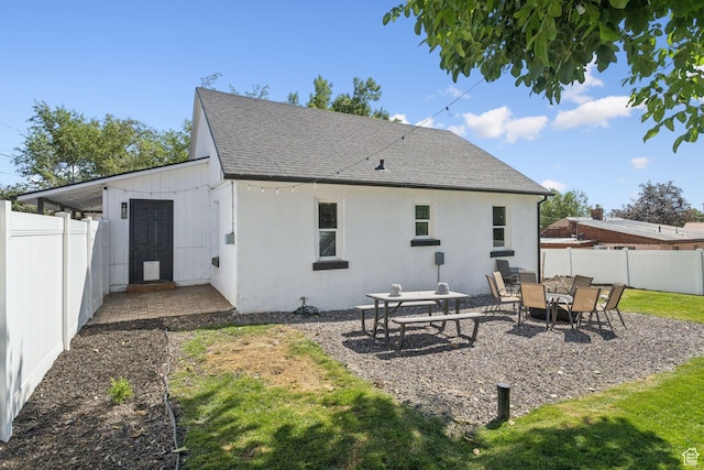 175 Grove Creek Dr N, Pleasant Grove, UT 84062 - rear view of house featuring a shingled roof, a fenced backyard, stucco siding, and a patio area
